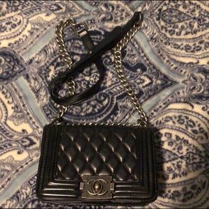 Black Chanel boy flap purse